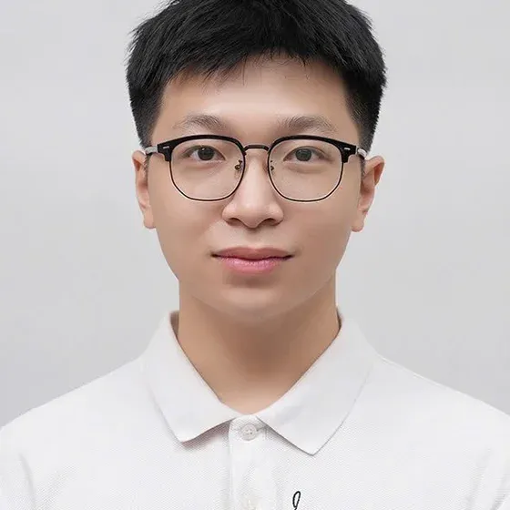 Nghia, photographed head and shoulders against a plain background.